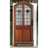 Large pine stained glass arched door with Rennie Mackintosh style leaded glass. Small cracks to