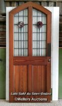 Large pine stained glass arched door with Rennie Mackintosh style leaded glass. Small cracks to