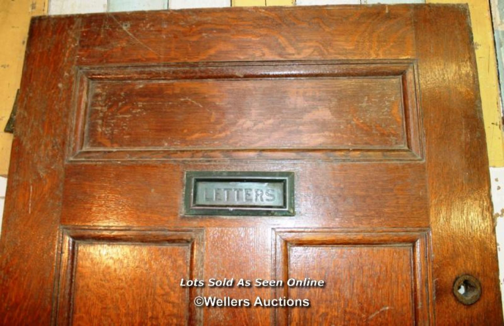 An Edwardian oak veneered door. Painted on one side. Letterplate to top of door. 91cm x 202cm x 4. - Image 2 of 3