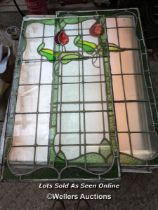 A pair of Art nouveau stained glass panels. Some breaks. 56cm x 98cm