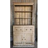 Stripped pine Victorian dresser for restoration. Open shelf over two drawers and two cupboards.