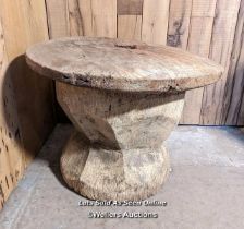 A very large grain mortar. West African. Hardwood. The lid (75cm across) had a hole, now patched