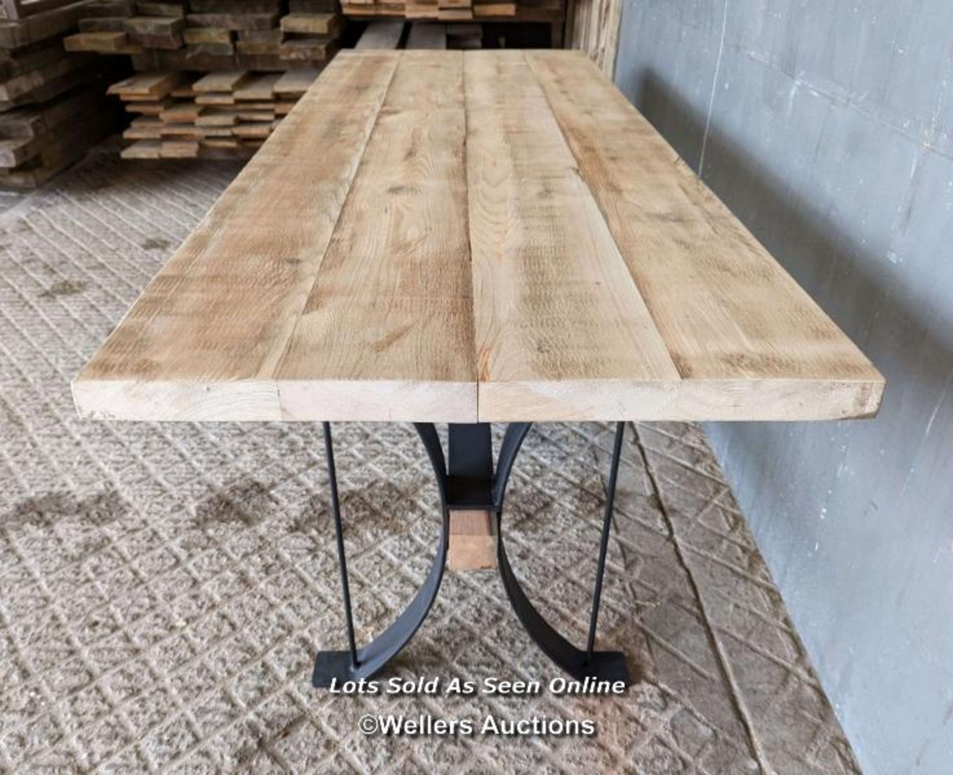 Dining table with wrought iron base and reclaimed pine top and stretcher. 8 seater. 198cm L x 78cm W - Image 2 of 6