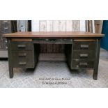 A vintage metal knee hole desk with later oak top. 157cm W x 76cm H x 89cm D. Some marks, ex shop