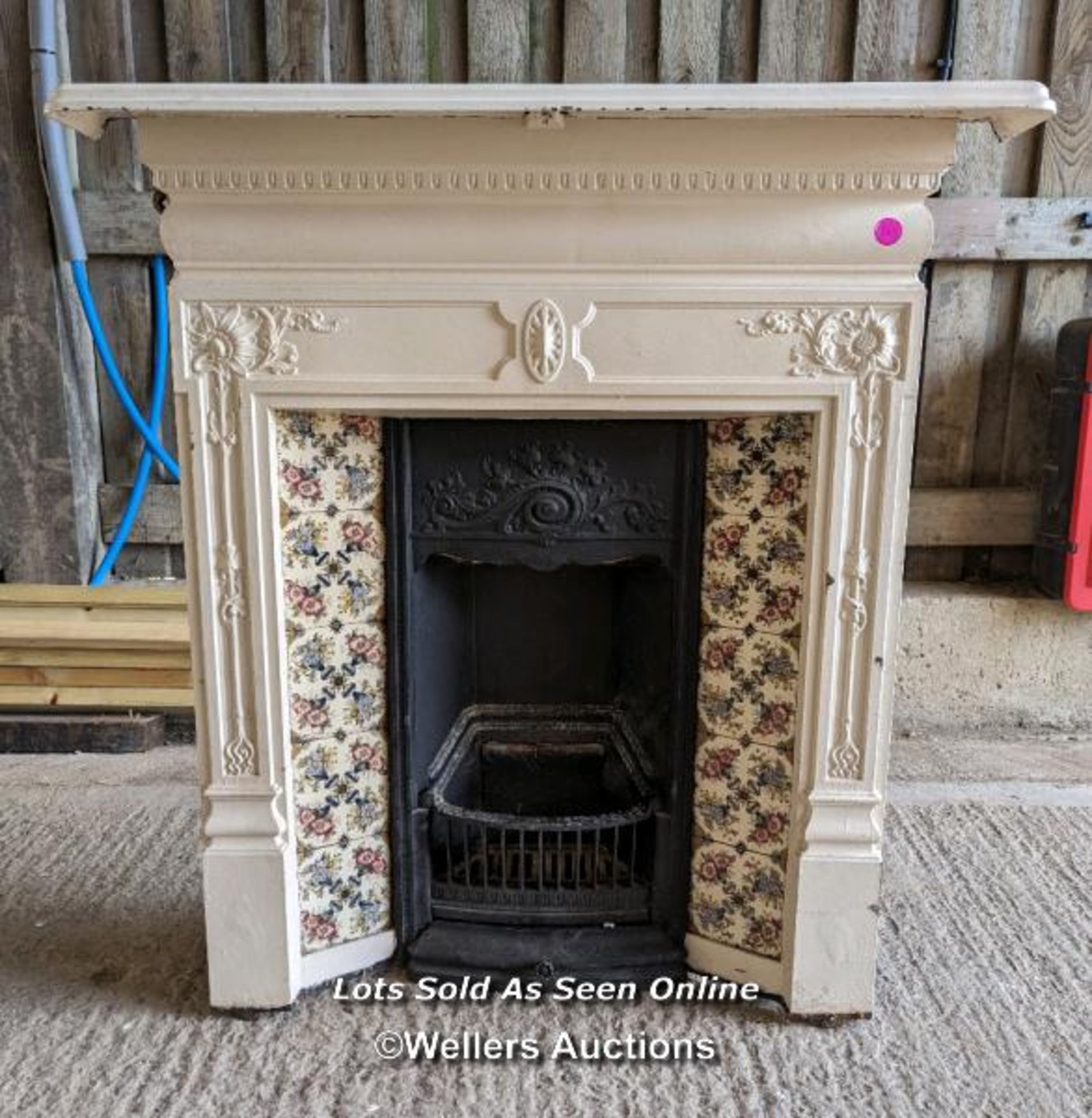 Edwardian painted cast iron combination fireplace with tiles. Complete except for one lug missing.