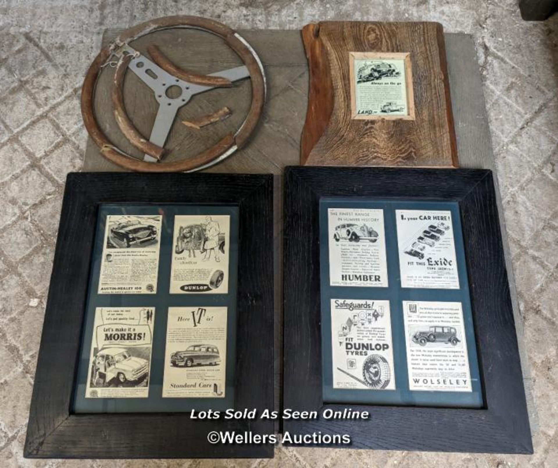 3 motoring related framed prints and 1 vintage steering wheel, 38cm diameter, for restoration