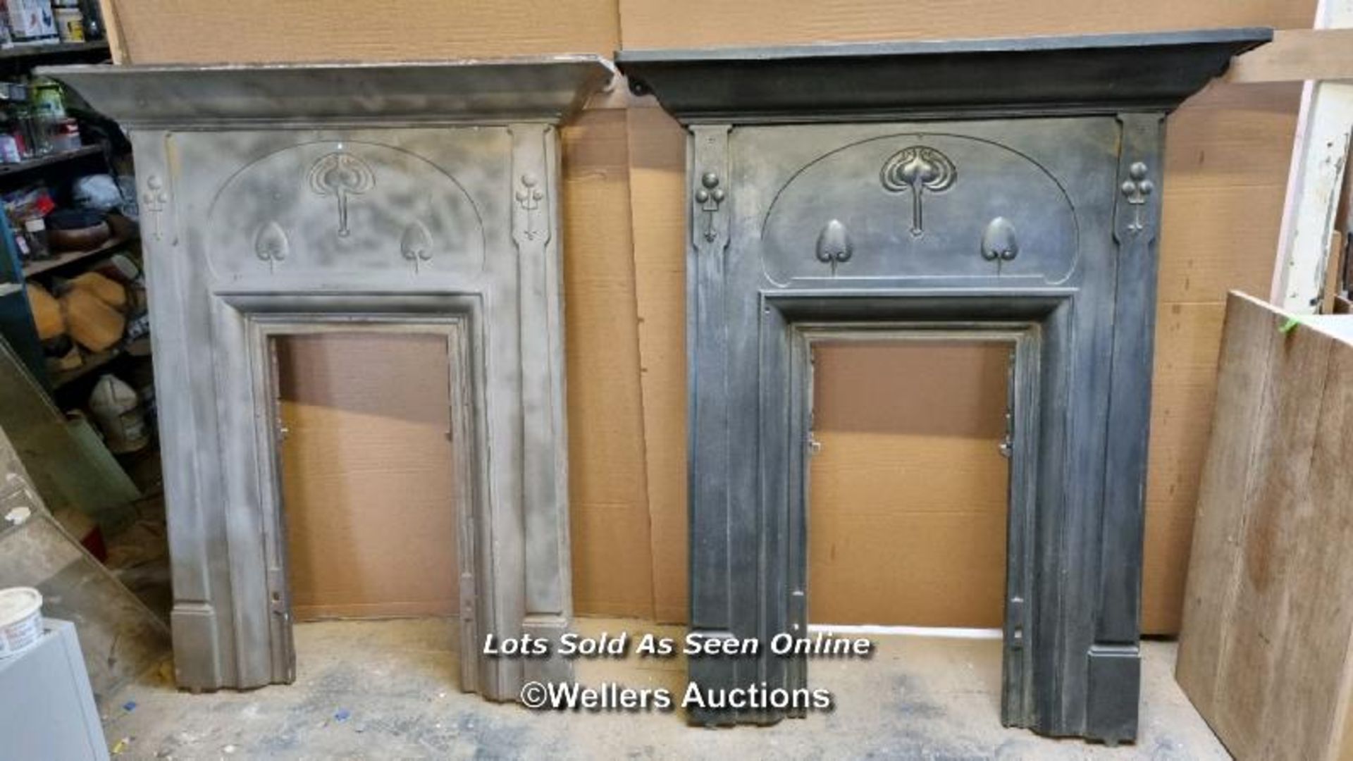 A pair of cast iron fire fronts. Rare design, Arts and Crafts, dated 1906 with Reg Date stamp on