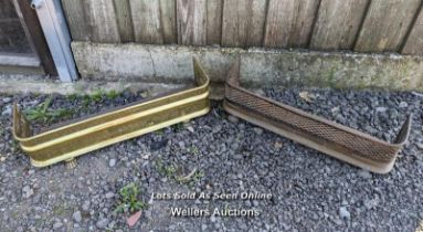 2 brass fire fenders. Polished fender is 87cm x 31cm. Unpolished fender is 82cm x 25cm