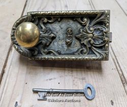 A decorative French brass rimlock with key and modern brass keep. Recently restored. 16.5cm L x