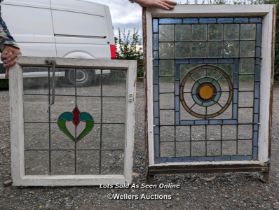 6 stained glass panels in pine frames. Some damage to glass and frames