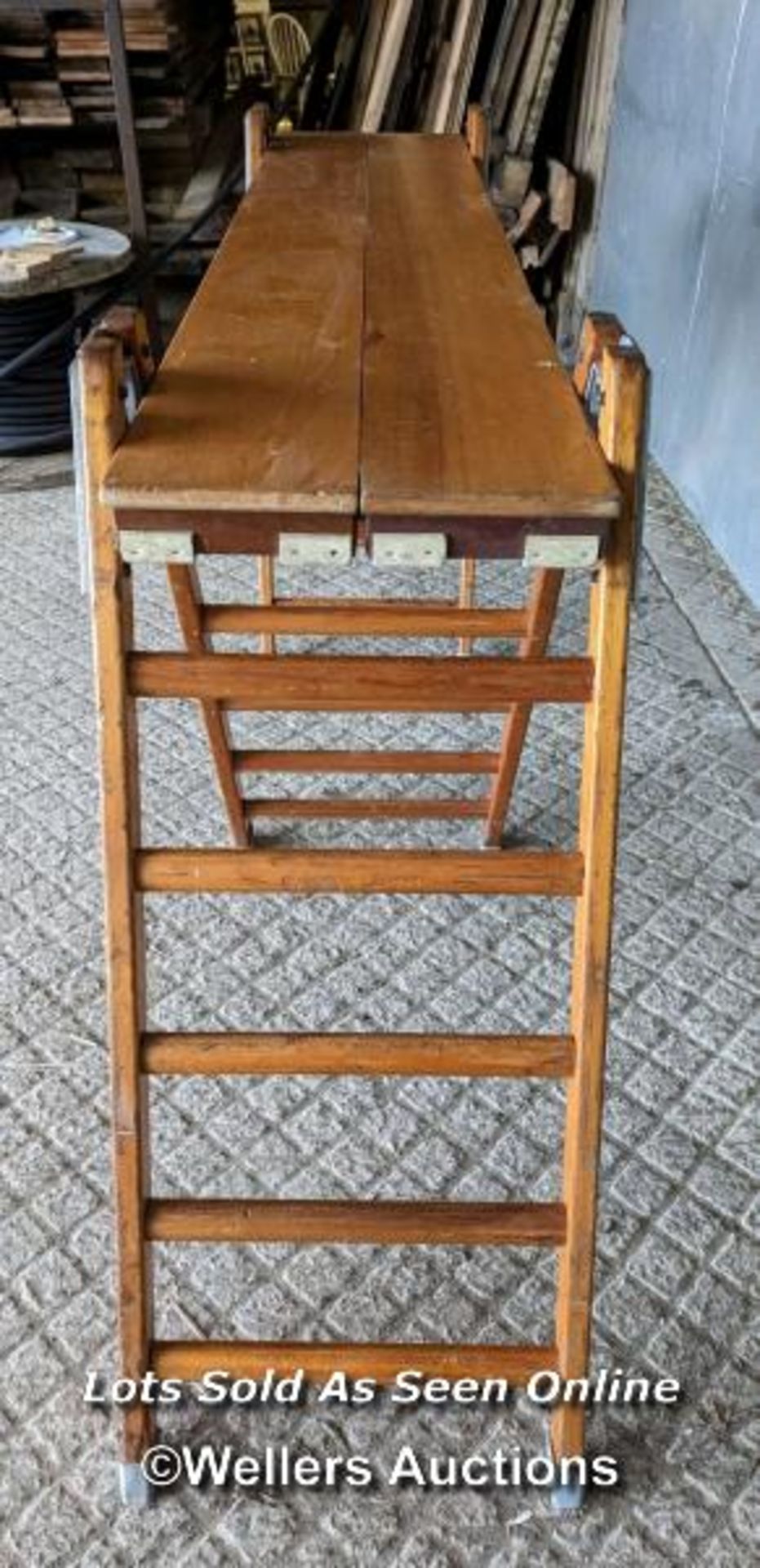 The London Gymnasium company bench. Beech or hardwood with metal brackets. 289cm W x 52cm D x - Image 5 of 5