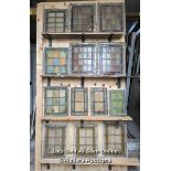 13 stained glass panels. Sizes from 23cm to 34cm W and 37cm to 50cm T. Some breaks in the glass