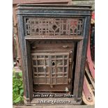 An Art Deco woodburning stove for restoration. Outer decorative removable frame in cast iron. 85cm H