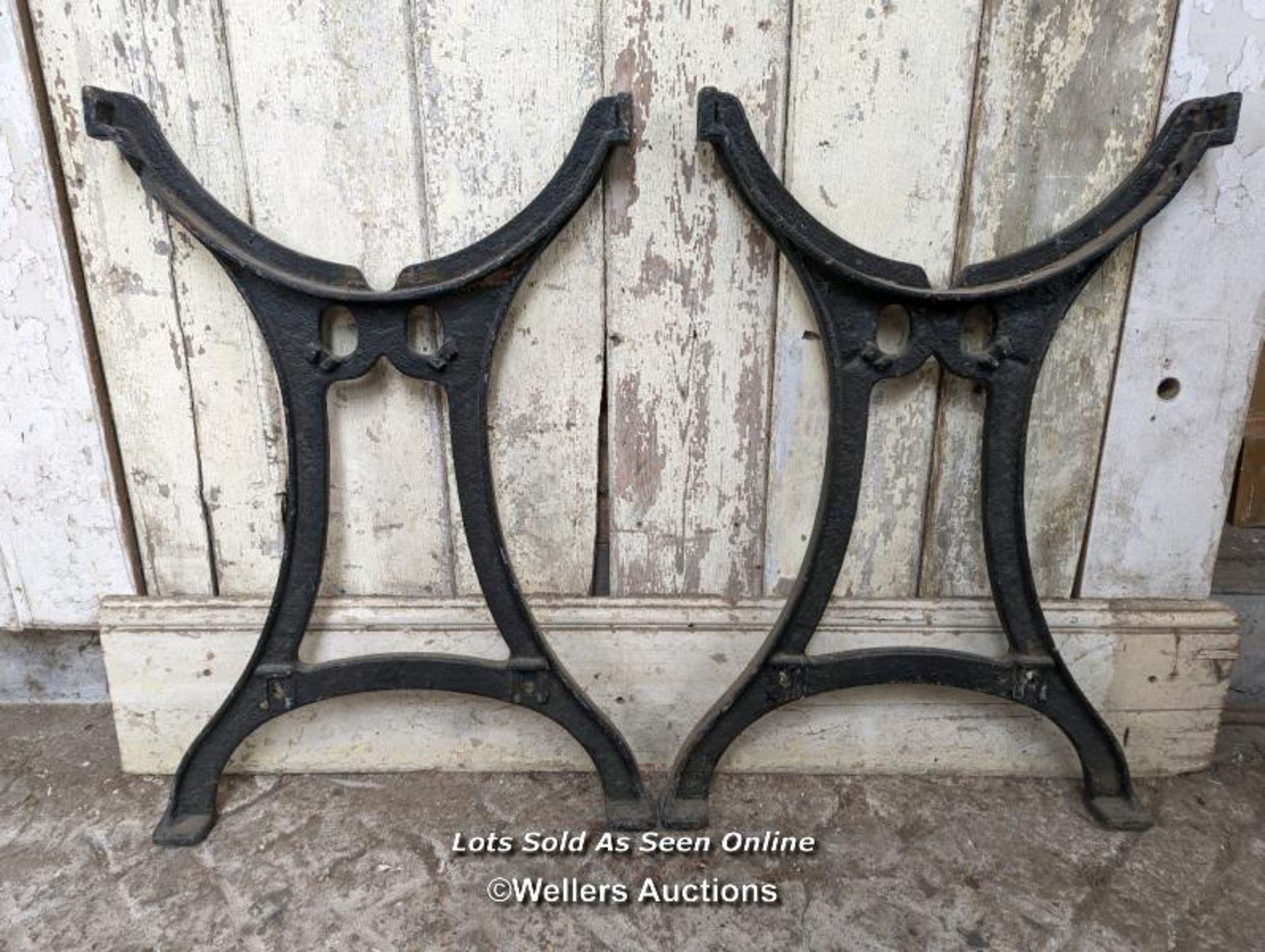 Pair of metal table ends. Cast iron, 74cm H x approx 50cm W - Image 2 of 2