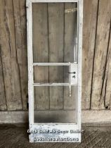 Crittall steel door and frame. Working handle. Original glass, central panel broken. C1930.