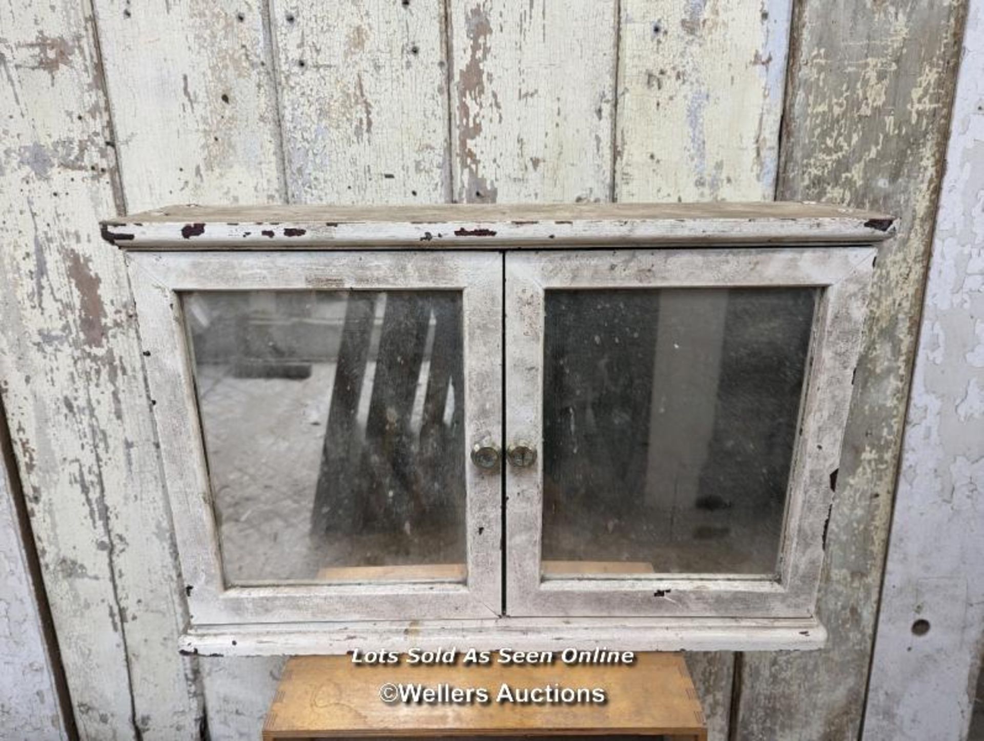 An oval mirror on stand, a set of drawers (top drawer missing) and a glazed wall cupboard with - Image 2 of 4