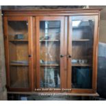 Glazed pine wall cupboard, 3 opening doors, glass intact, 2 shelves. Wired for lighting, not PAT