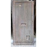 A Victorian oak cottage door for restoration. Previous owner has added baton to deal with plank