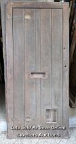 A Victorian oak cottage door for restoration. Previous owner has added baton to deal with plank