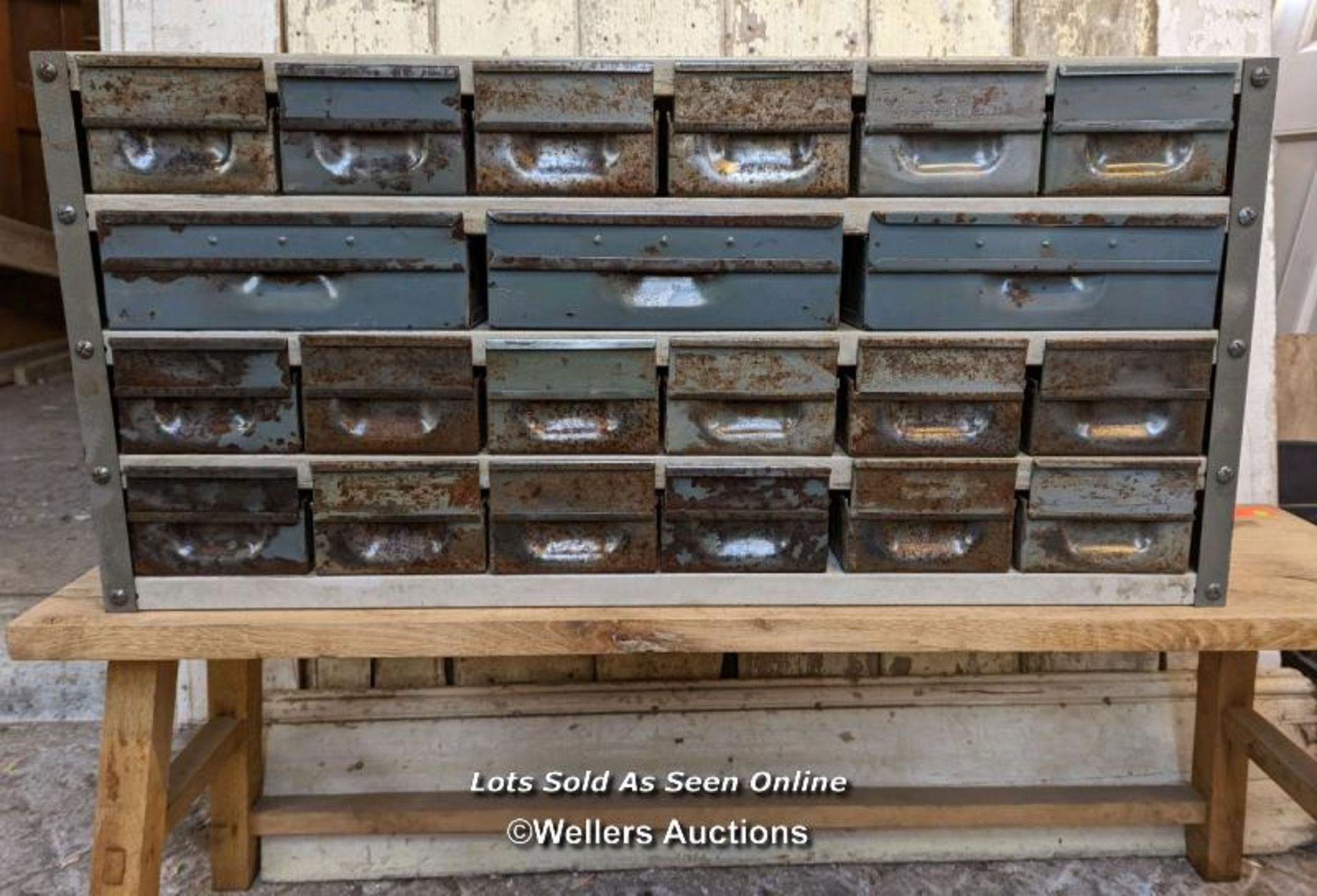 Set of industrial metal drawers for restoration. 21 drawers. Overall size 91cm W x 43cm H x 30cm D