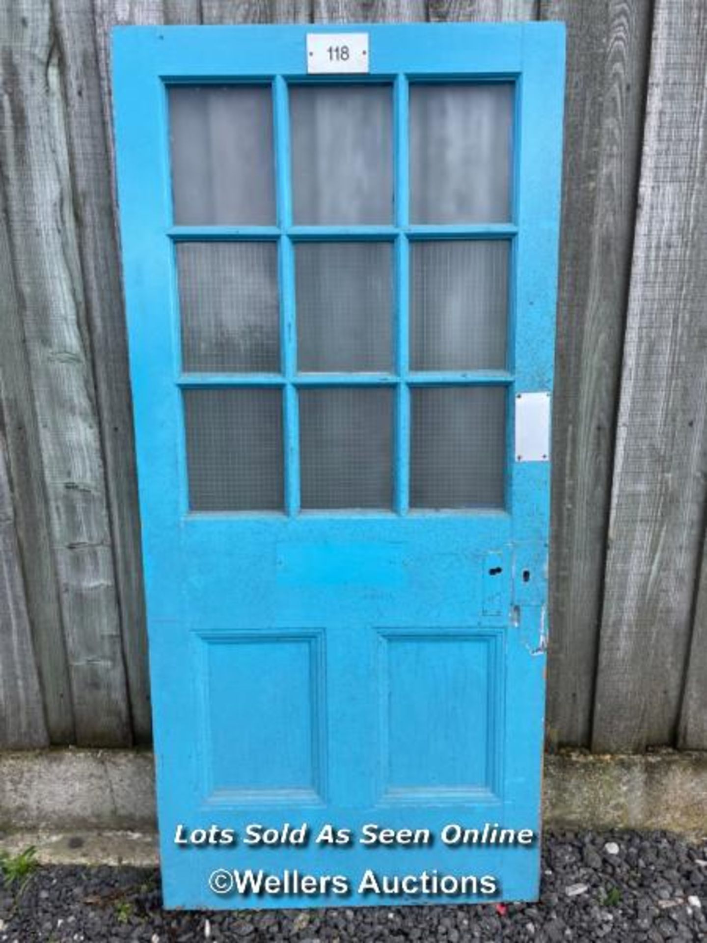 Reclaimed pine school door with 9 glazed panels, 6 of them with wired safety glass. 92cm x 200cm x