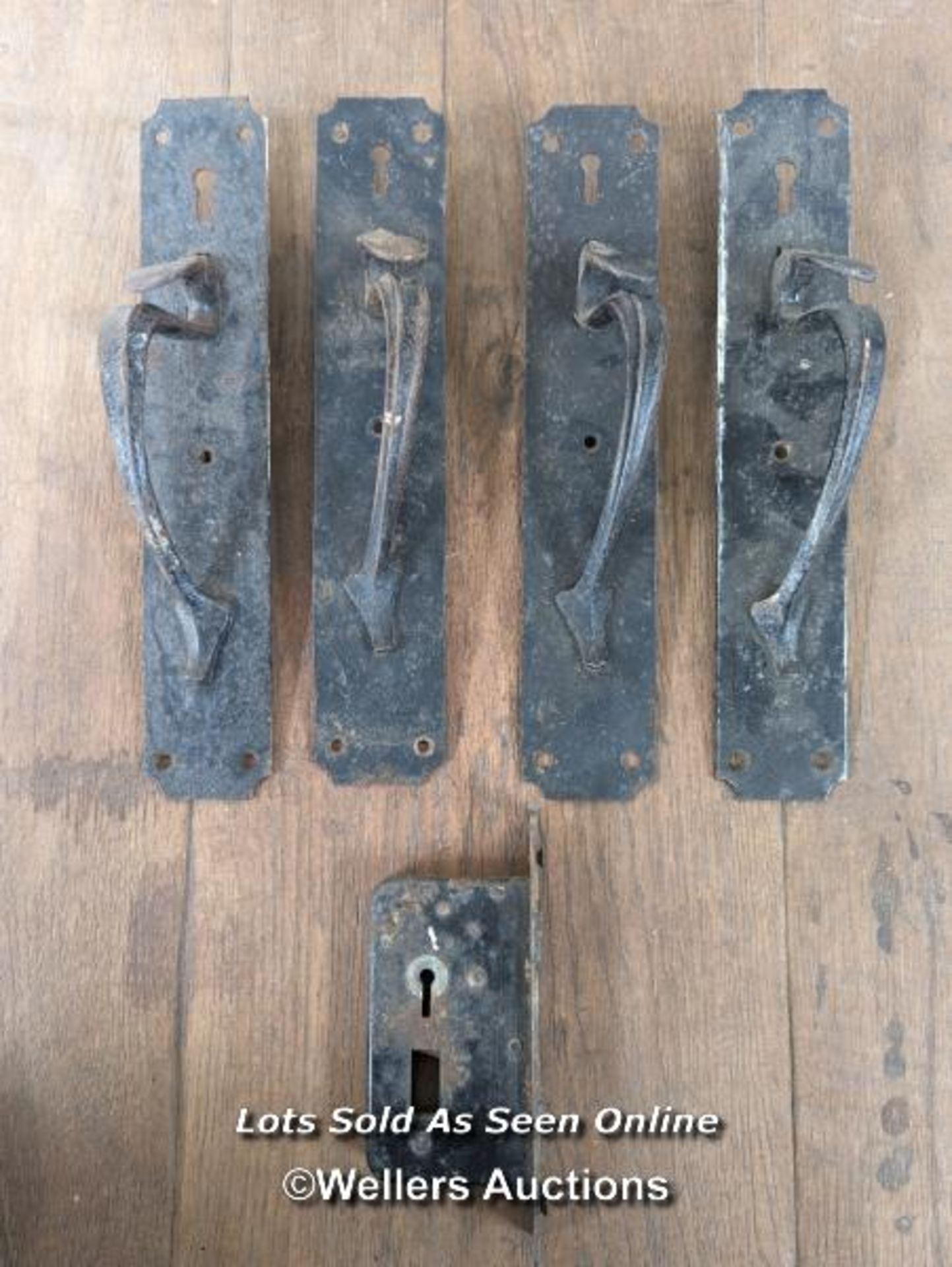 2 pairs of iron Art Nouveau door pulls with one weight lock. Backplates of handles 28cm tall by