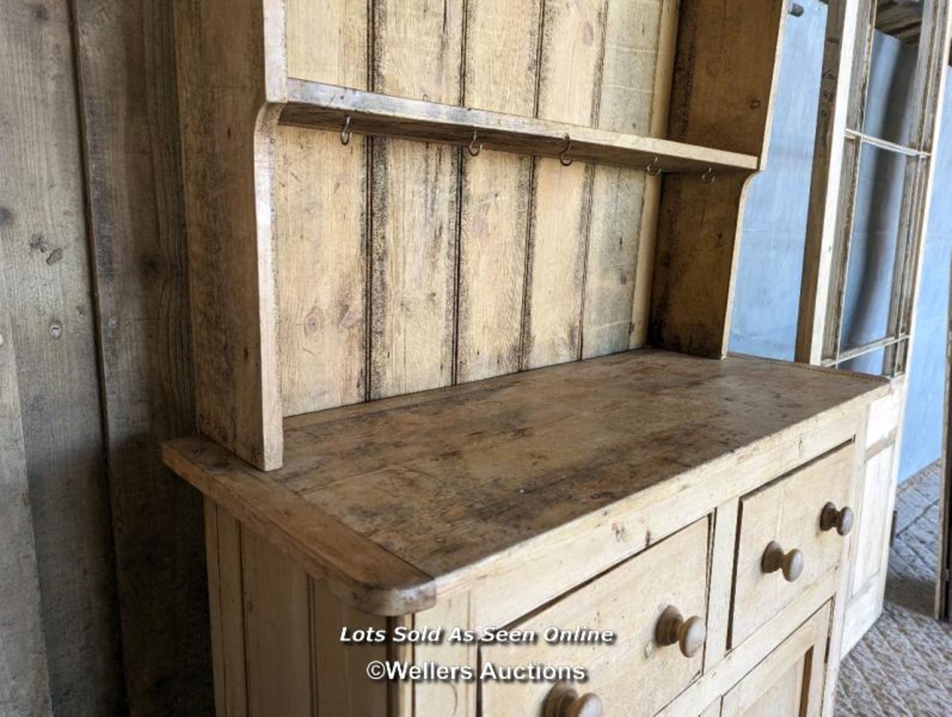 Stripped pine Victorian dresser for restoration. Open shelf over two drawers and two cupboards. - Image 6 of 6