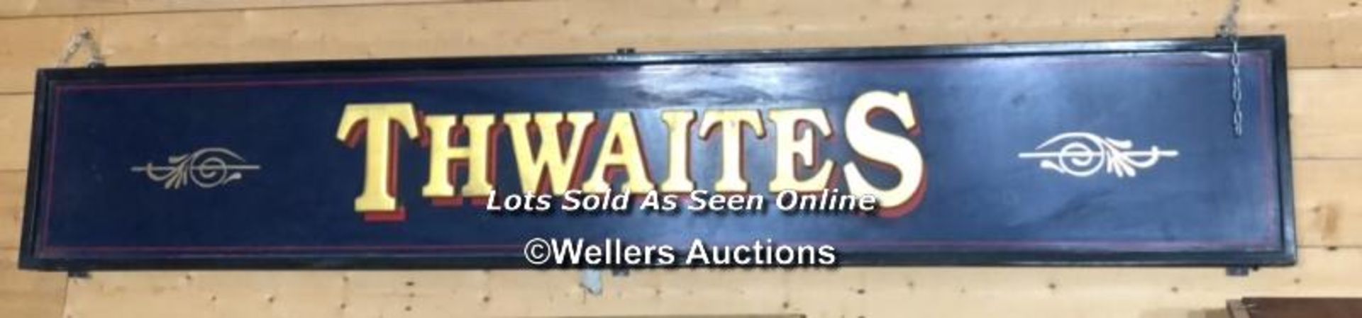 "THWAITES" PUB SIGN, 50CM (H) X 300CM (W) X 6CM (D), RECLAIMED FROM THE ORIGINAL THWAITES & CO.