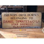 "BREWERY DRAY HORSES, BELONGING TO DANIEL THWAITES & CO. LTD" WOODEN SIGN, 77CM (H) X 185CM (W) X