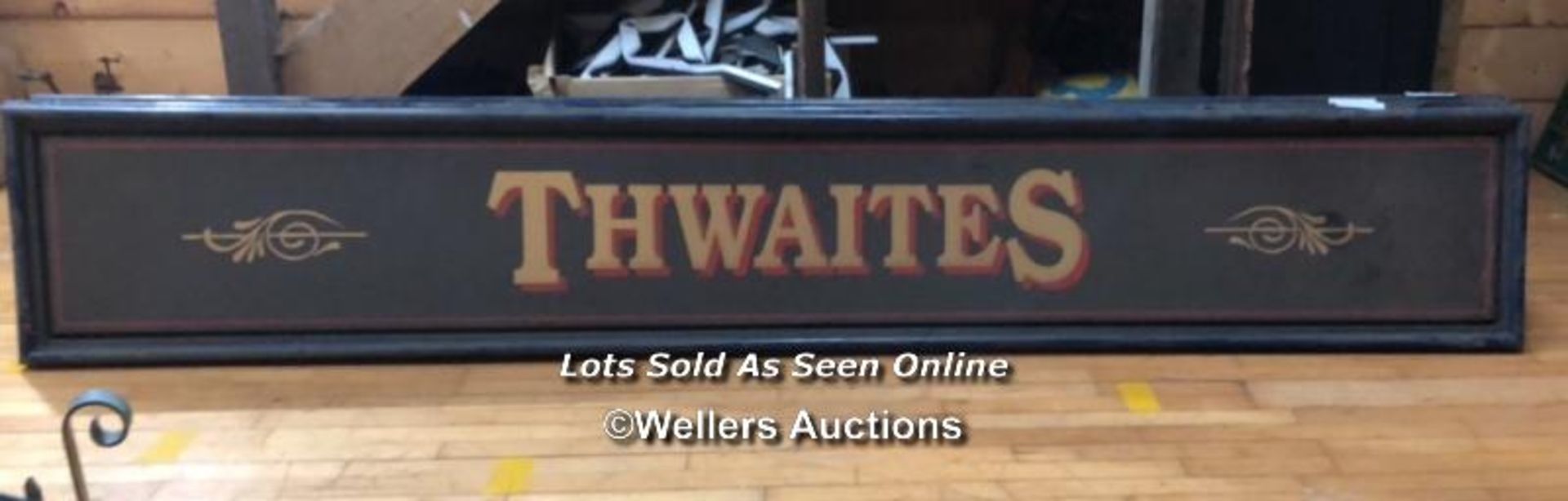 "THWAITES" PUB SIGN, 50CM (H) X 300CM (W) X 6CM (D), RECLAIMED FROM THE ORIGINAL THWAITES & CO.