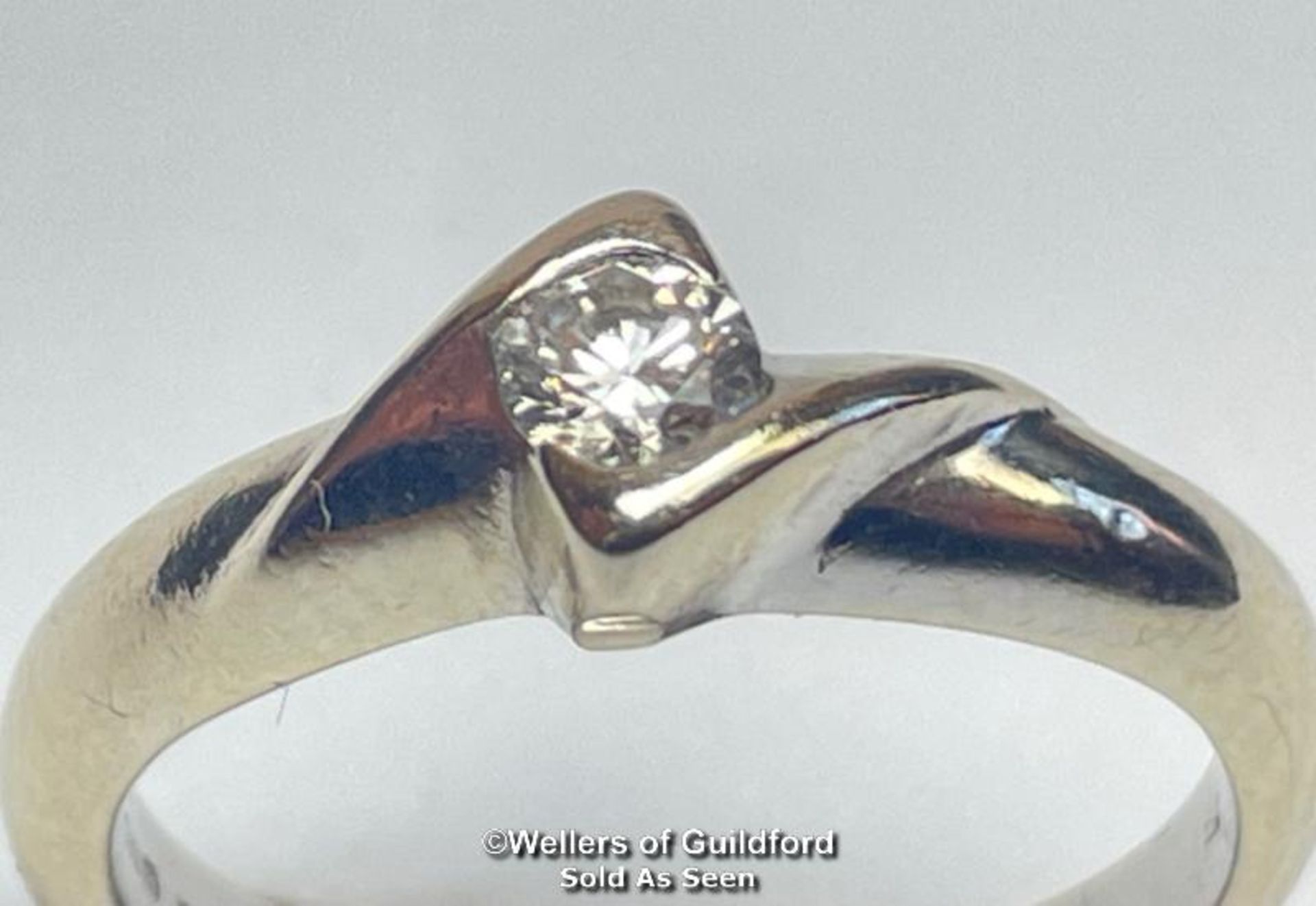 Diamond solitaire ring in square twist setting. Hallmarked 18ct gold. Estimated diamond weight 0.