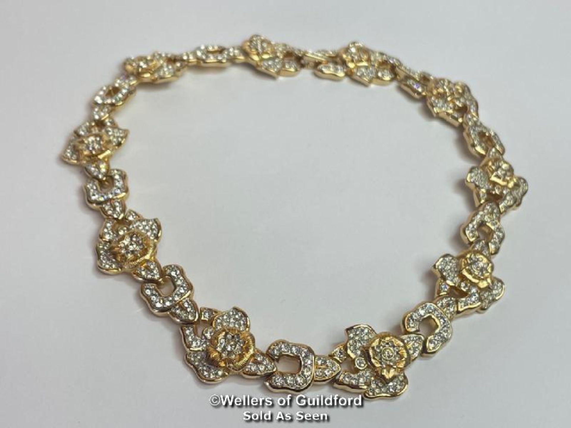 Swarovski crystal collar necklace in gold tone metal. Lenth 17"/ 44cm