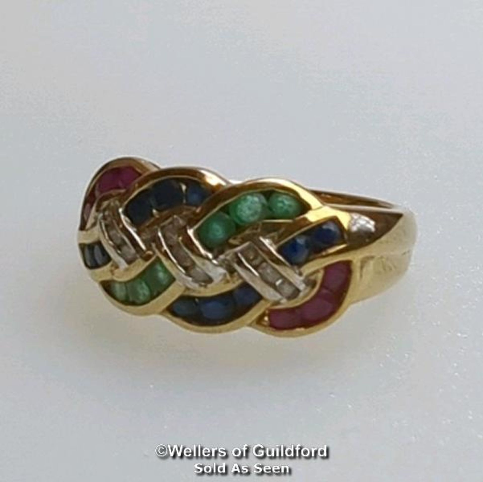Diamond, sapphire, ruby and emerald knot ring in hallmarked 9ct gold. Diamond weight estimated as - Image 6 of 8