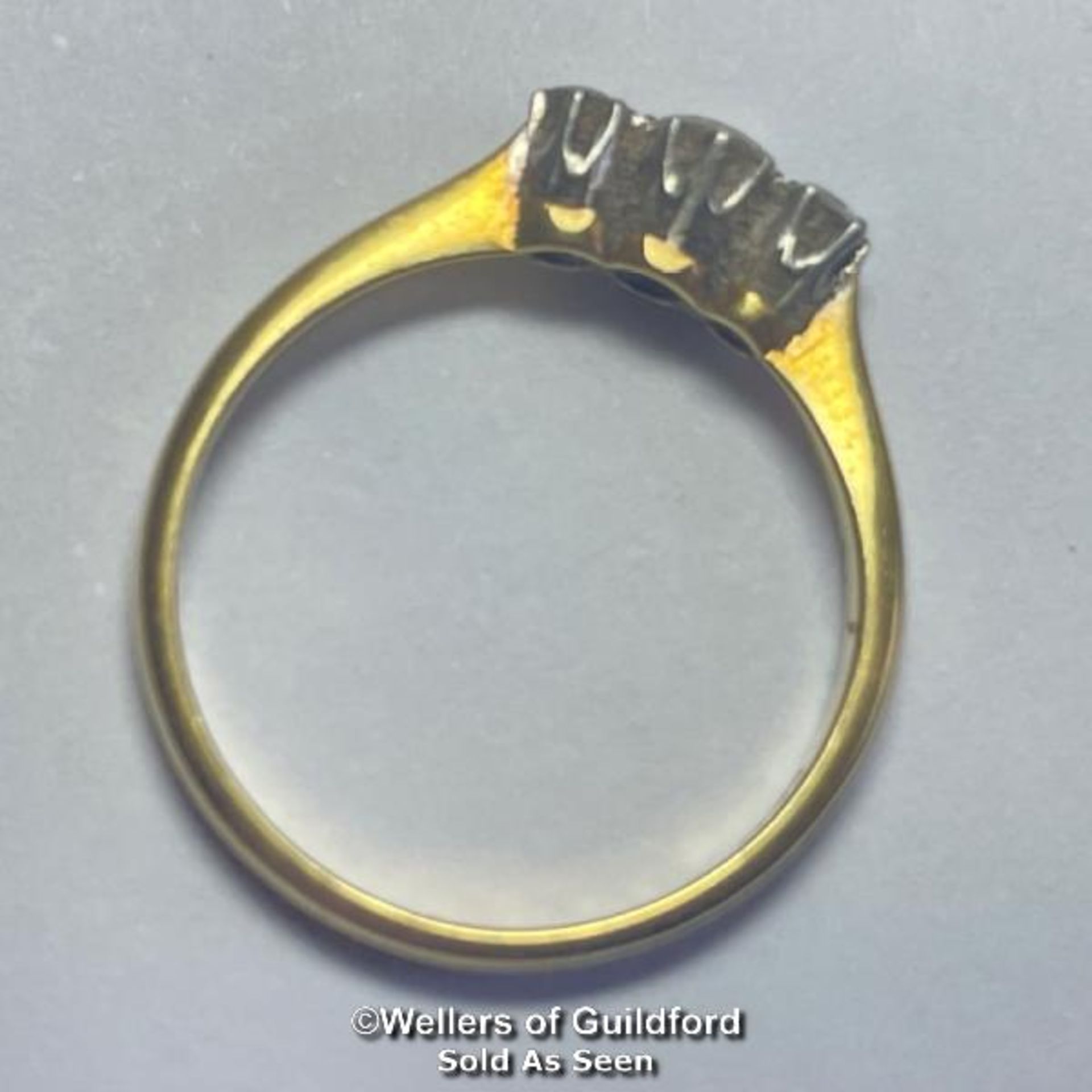 Diamond three stone ring. Estimated total diamond weight 0.22ct. Shank stamped 18ct and PT. Ring - Image 3 of 5