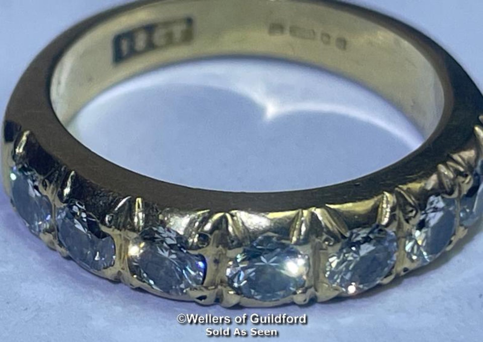 Diamond eternity half band ring in 18ct gold. Seven round cut brilliant diamonds estimated total - Image 4 of 6