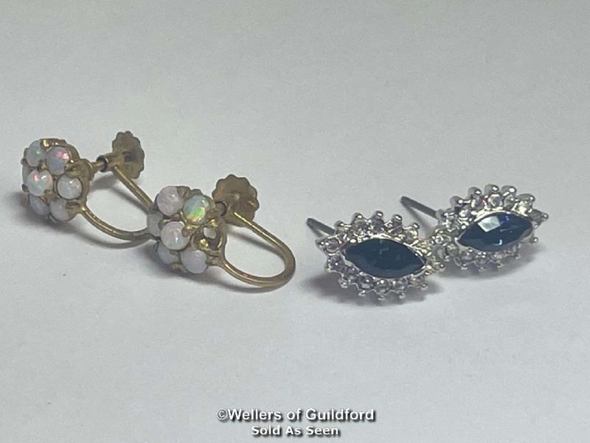 A pair of opal cluster earings in hallmarked 9ct gold with screw fittings and a pair of fashion