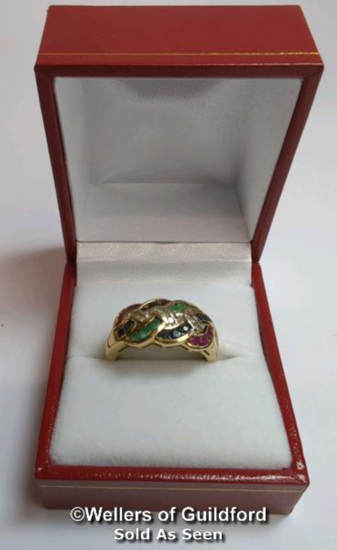 Diamond, sapphire, ruby and emerald knot ring in hallmarked 9ct gold. Diamond weight estimated as - Image 8 of 8