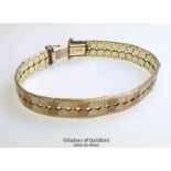 Three colour gold satin textured bracelet stamped 375, length 18cm, gross weight 18.66g. Condition -