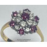 Ruby and diamond double cluster ring in 18ct gold. Total diamond weight estimated as 0.50g, colour