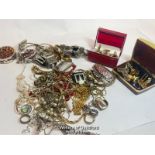 Assorted costume jewellery including brooches, necklaces, bangles and cufflinks