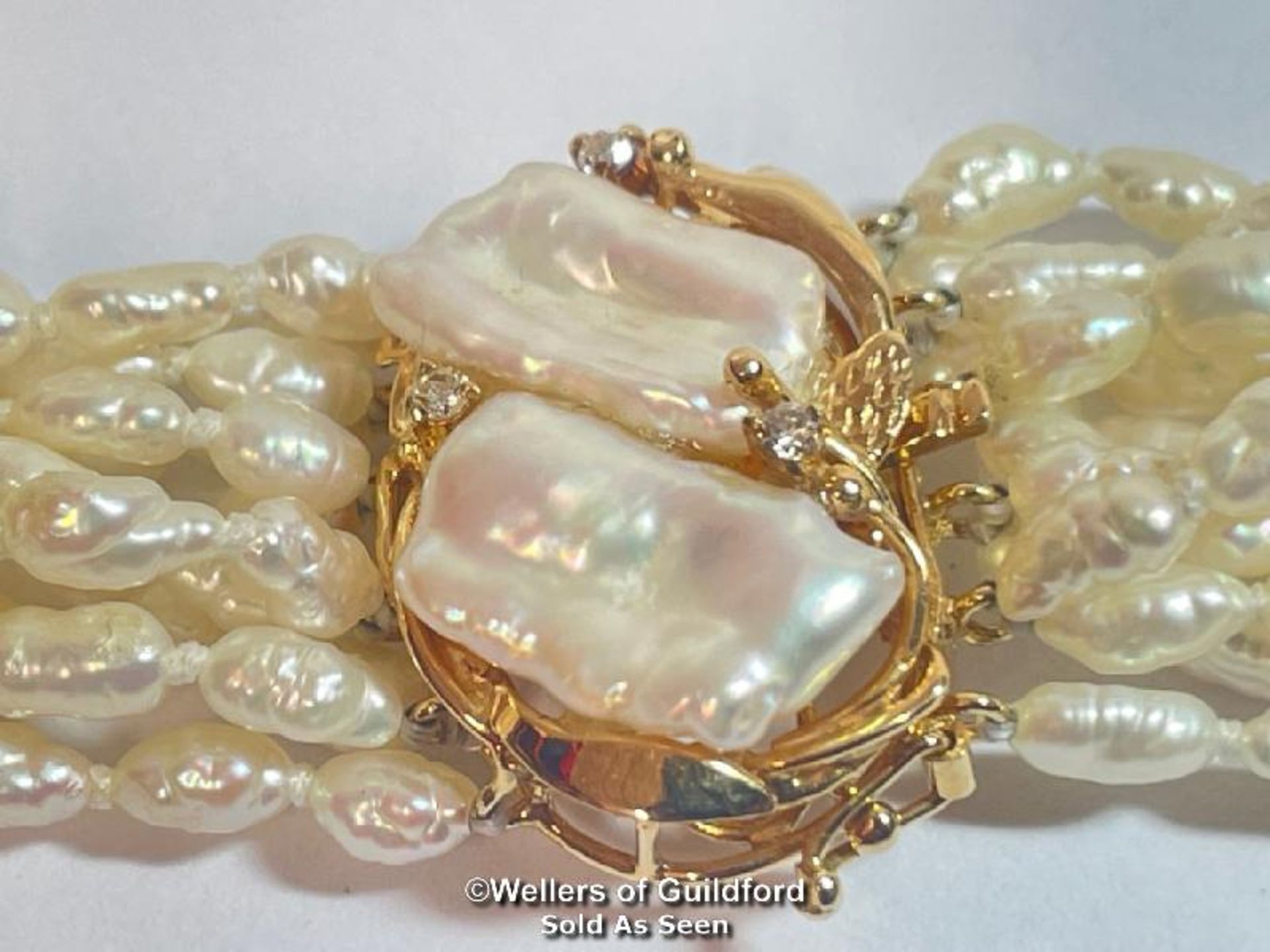 A multi row necklace of eleven rows of cultured freshwater rice pearls strung to clasp set with - Image 4 of 6