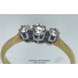 Diamond three stone ring. Estimated total diamond weight 0.22ct. Shank stamped 18ct and PT. Ring