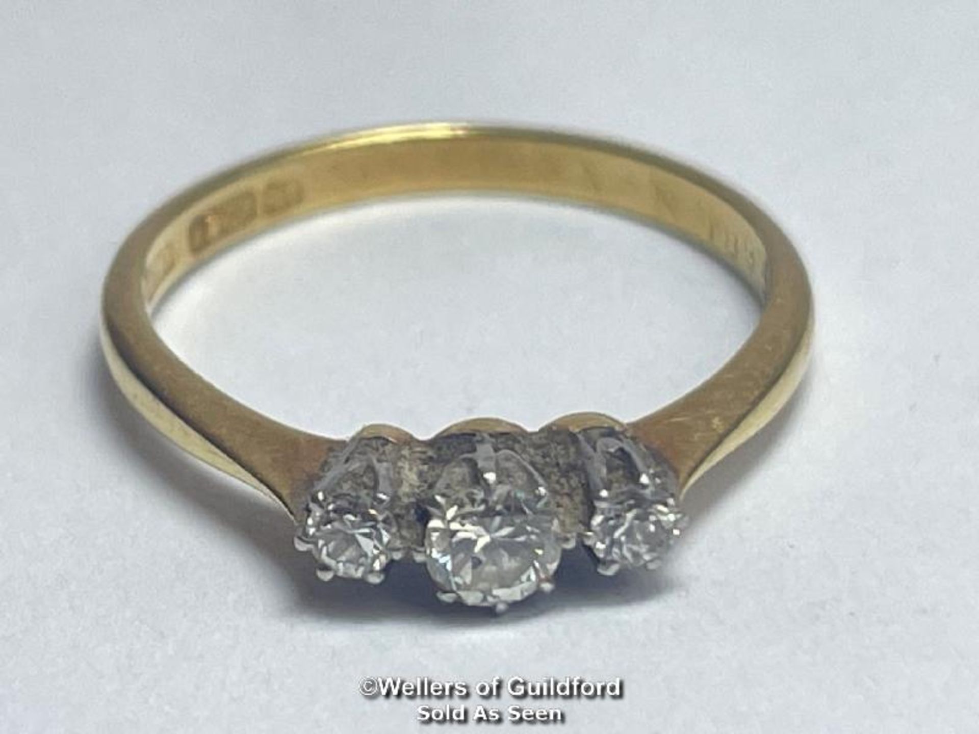 Diamond three stone ring. Estimated total diamond weight 0.22ct. Shank stamped 18ct and PT. Ring - Image 2 of 5