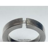 Diamond and Titanium ring by Feniom. Estimated diamond weight 0.04ct, ring size I 1/2