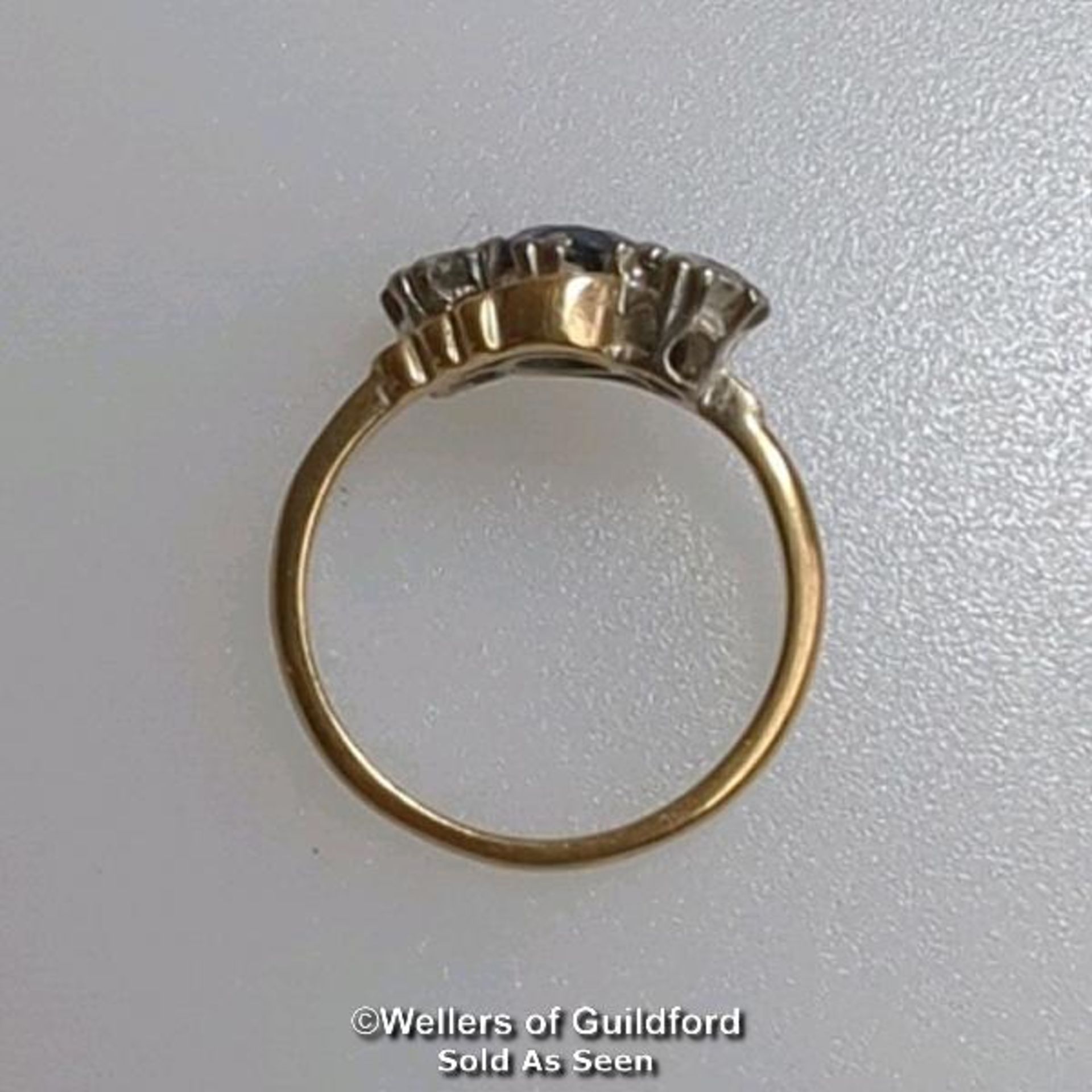 Synthetic sapphire and white sapphire three stone ring in a mount stamped 9ct gold. Ring size L. - Image 3 of 6