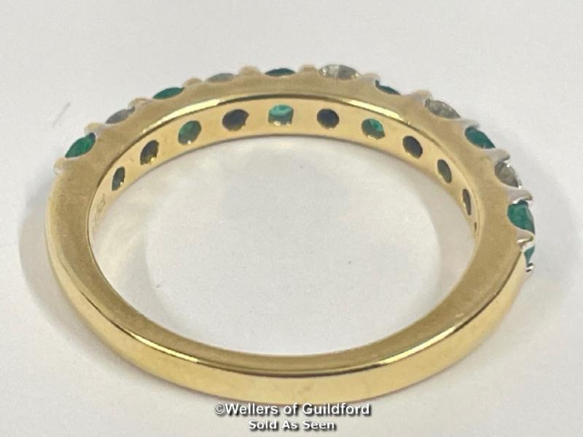 Emerald and diamond eternity half band stamped 18ct, ring size o, diamond weight 0.40ct estimated - Image 3 of 5