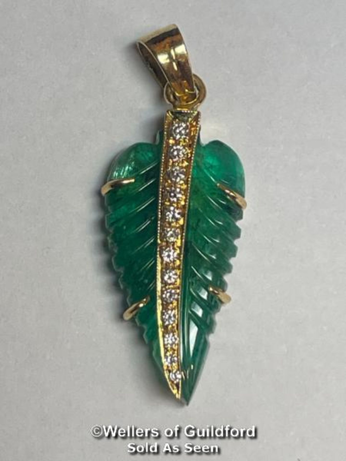 Leaf cut emerald pendant set with thirteen brilliant cut diamonds, estimated diamond weight 0. - Image 4 of 4