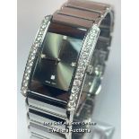 Tungsten wristwatch, quartz movement, tank style case with cubic zirconia borders on mirror