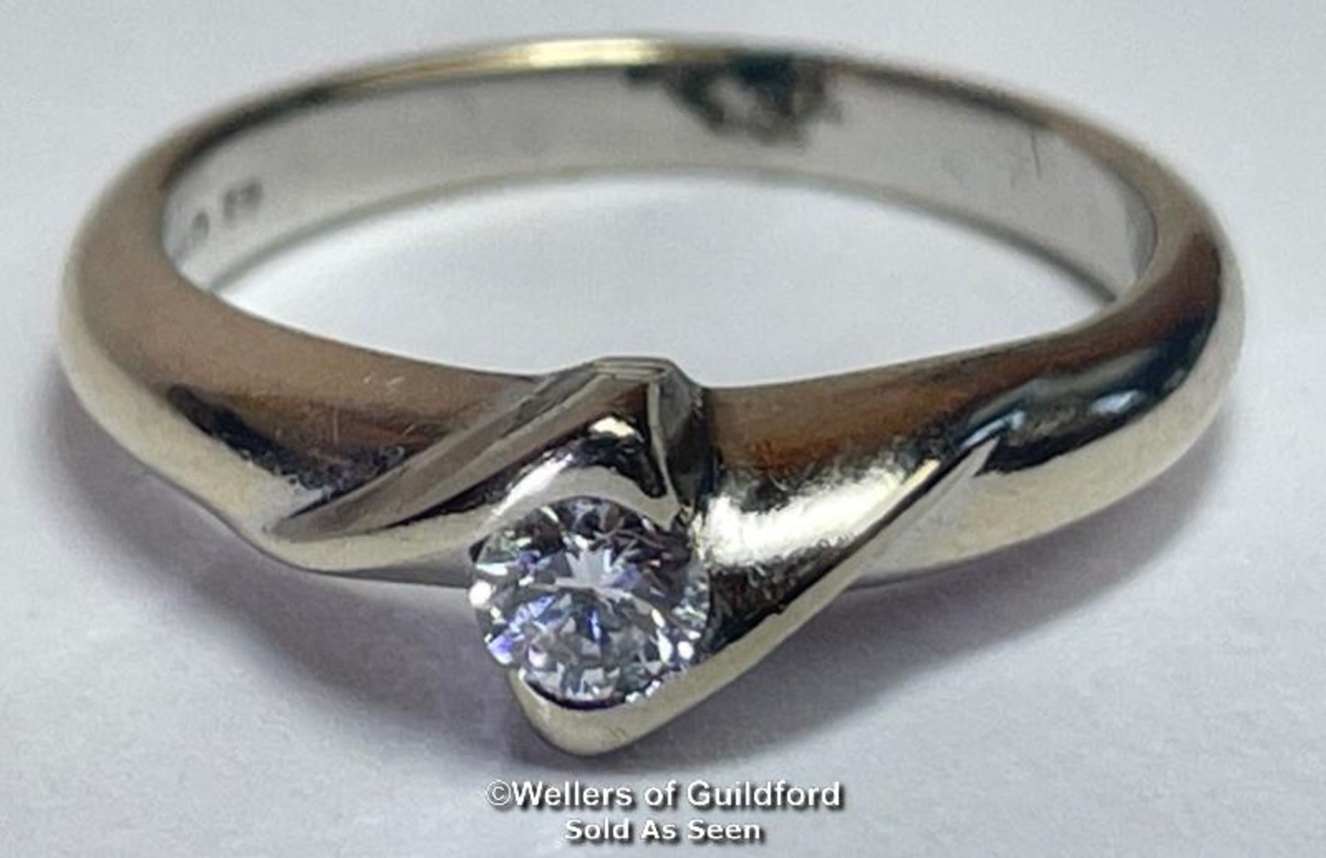 Diamond solitaire ring in square twist setting. Hallmarked 18ct gold. Estimated diamond weight 0. - Image 2 of 5