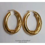 A pair of oval hoop earrings in hallmarked 9ct gold, length 4cm, gross weight 6.83g